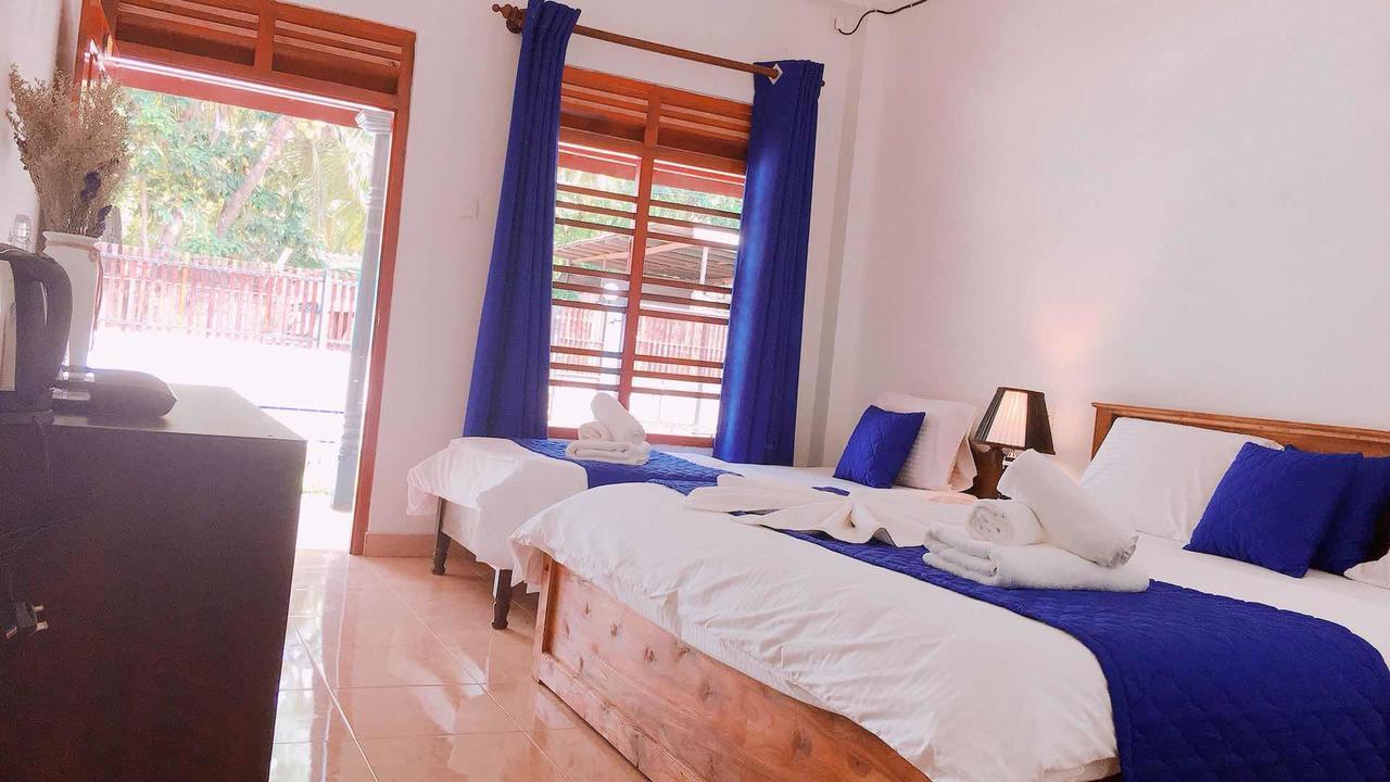 Blue Whale Holiday Hotel มิริสซา ภายนอก รูปภาพ