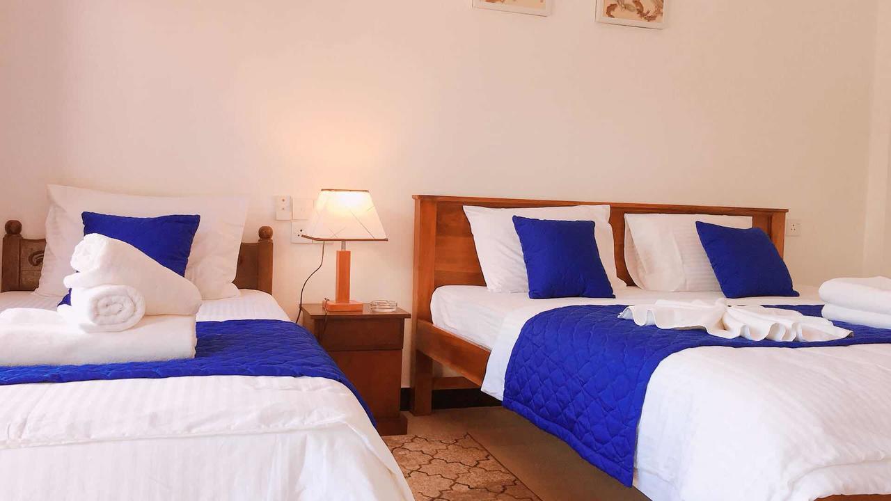 Blue Whale Holiday Hotel มิริสซา ภายนอก รูปภาพ